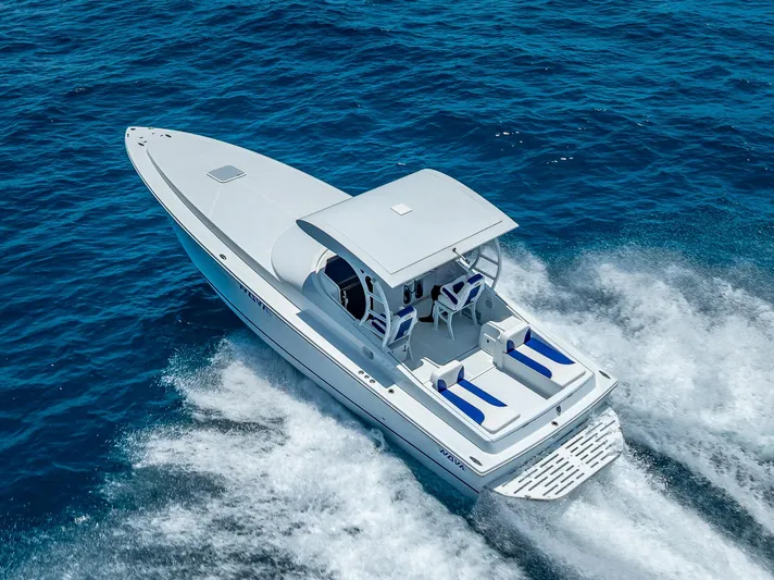  Yacht Photos Pics 2020 Nova 39 Sport boat cruising on blue ocean waters.