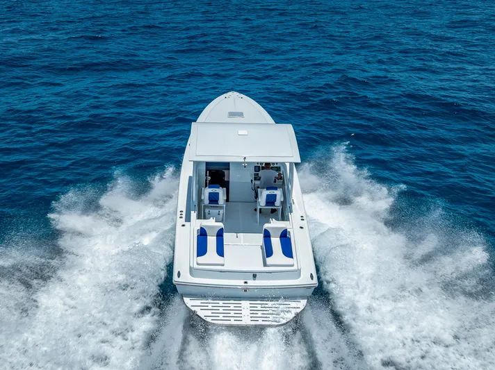  Yacht Photos Pics Nova 39 Sport 2020 boat cruising on open blue sea, aerial view.