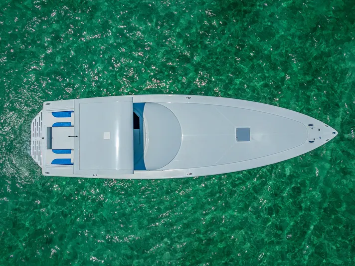  Yacht Photos Pics Aerial view of 2020 Nova 39 Sport boat on clear turquoise water.