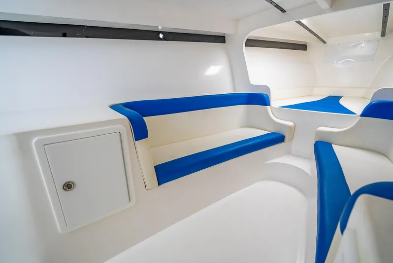 Yacht Photos Pics Interior of 2020 Nova 39 Sport boat with blue and white seating.
