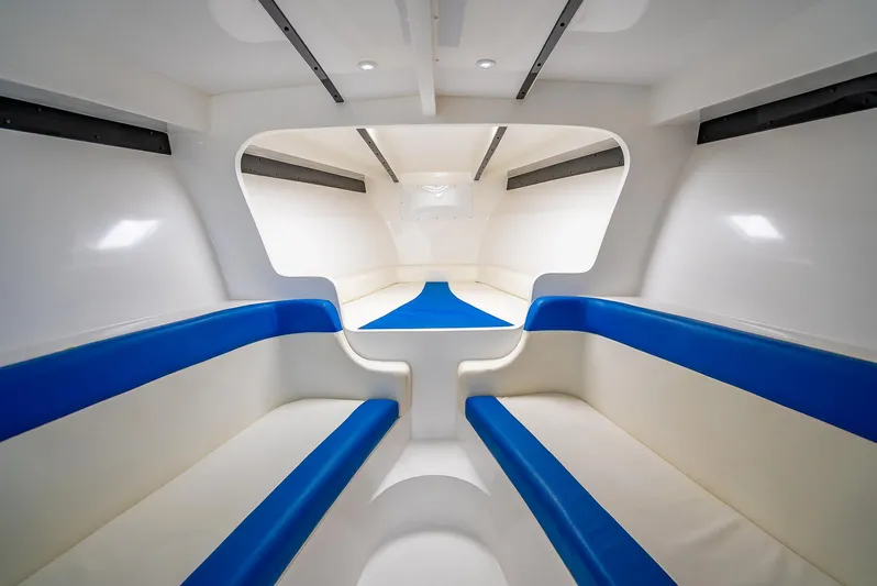 Yacht Photos Pics Interior of 2020 Nova 39 Sport boat with blue and white seating.