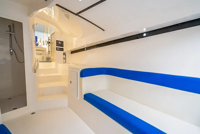  Yacht Photos Pics Interior of 2020 Nova 39 Sport boat with blue seating and modern design.