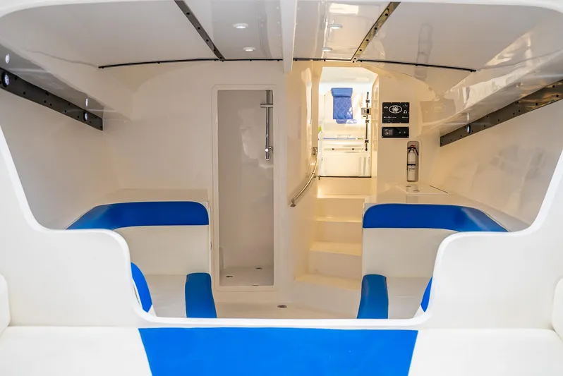  Yacht Photos Pics Interior of 2020 Nova 39 Sport boat with blue seating and modern design.