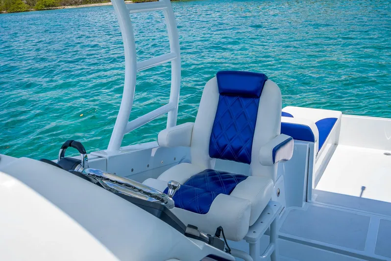  Yacht Photos Pics Luxurious seating on 2020 Nova 39 Sport boat with blue and white upholstery.