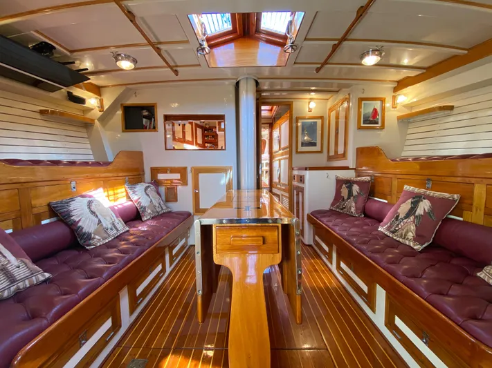Windigo Yacht Photos Pics Interior of a 1956 Hinckley ocean racer with polished wood and plush seating.
