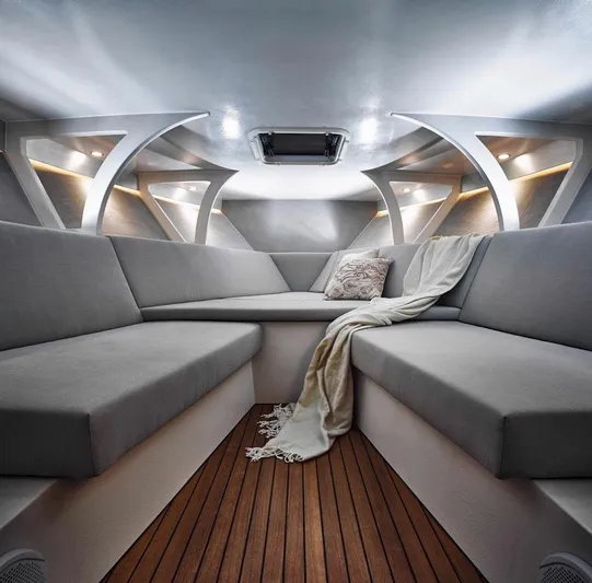  Yacht Photos Pics Interior of 2020 Frauscher 1017 GT boat with modern seating and wooden flooring.