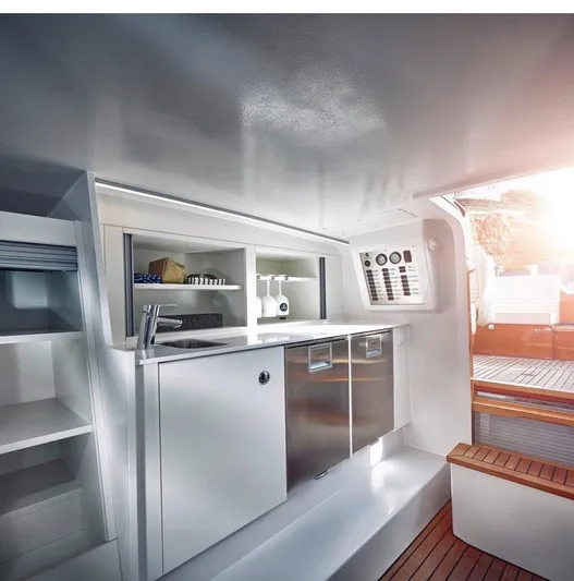  Yacht Photos Pics Interior of 2020 Frauscher 1017 GT yacht with modern kitchen amenities.