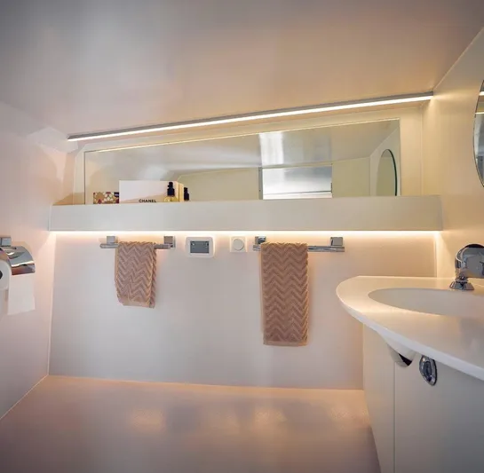  Yacht Photos Pics Modern bathroom interior of 2020 Frauscher 1017 GT yacht with sleek design and ambient lighting.