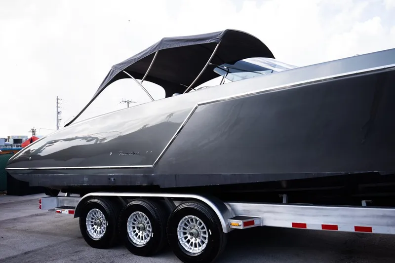  Yacht Photos Pics 2020 Frauscher 1017 GT luxury boat on a triple-axle trailer.