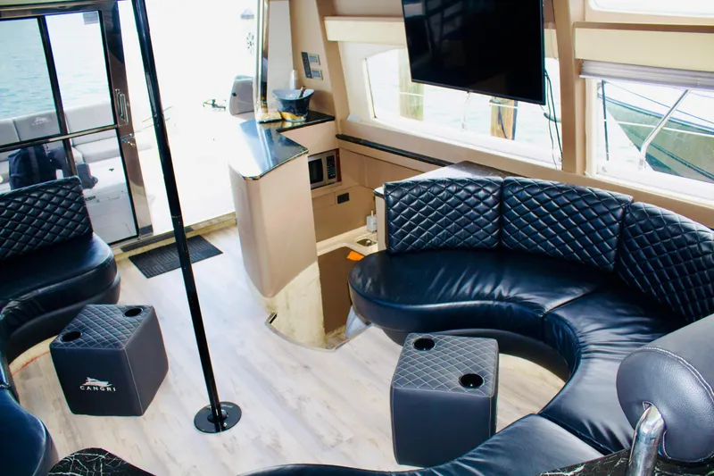  Yacht Photos Pics Luxurious interior of a 1997 Azimut 54 yacht with leather seating and modern decor.