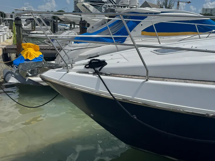  Yacht Photos Pics Azimut 54 yacht from 1997 docked at a marina, featuring sleek design and vibrant covers.