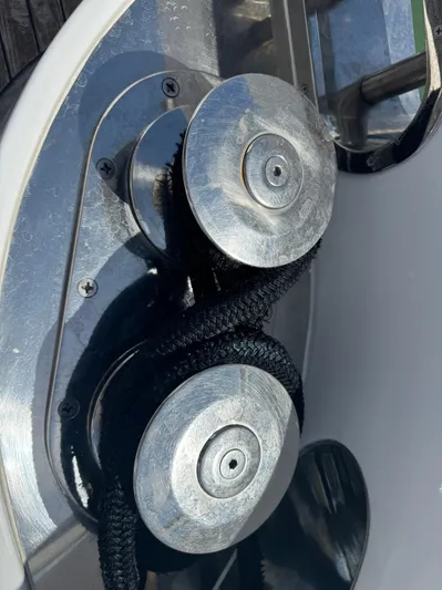  Yacht Photos Pics Close-up of a 1997 Azimut 54 yacht's winch with black rope.