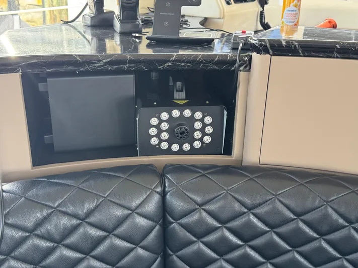  Yacht Photos Pics Control panel on a 1997 Azimut 54 yacht with quilted leather seating.