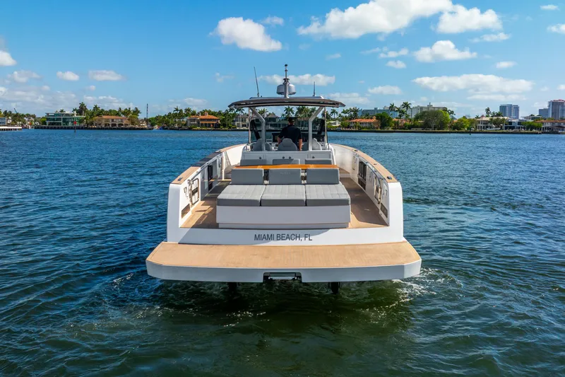  Yacht Photos Pics 2021 Pardo Yachts 43 cruising in Miami Beach waters under a clear blue sky.
