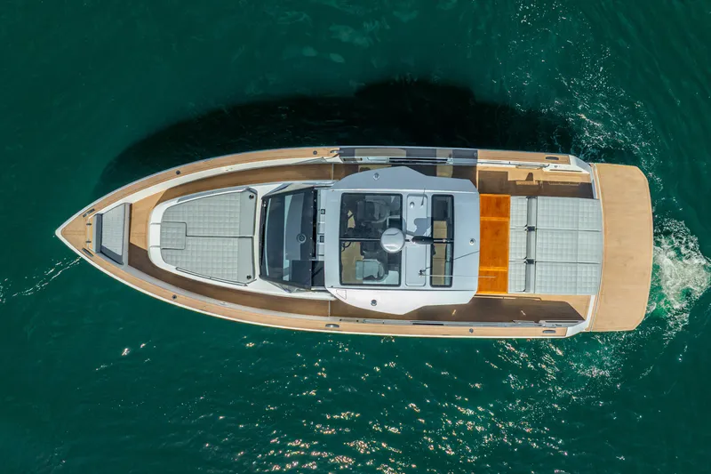  Yacht Photos Pics Overhead view of 2021 Pardo Yachts 43 cruising on clear blue water.