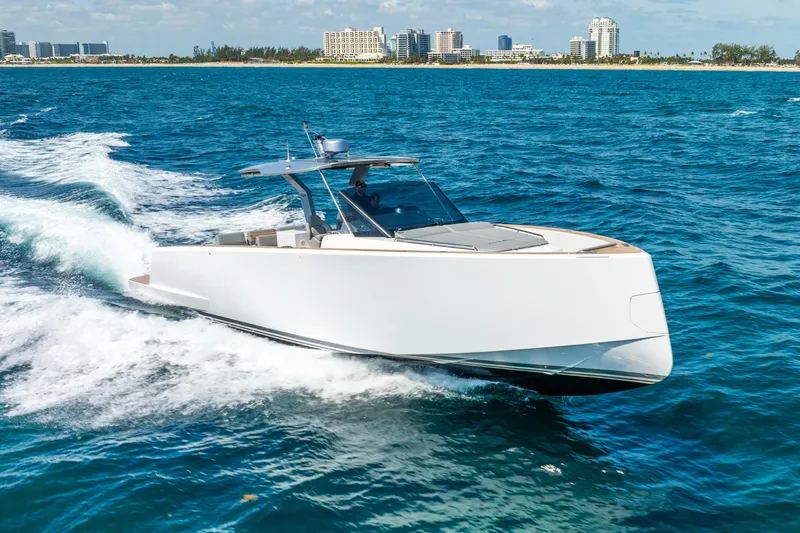  Yacht Photos Pics 2021 Pardo Yachts 43 cruising on blue ocean near city skyline.