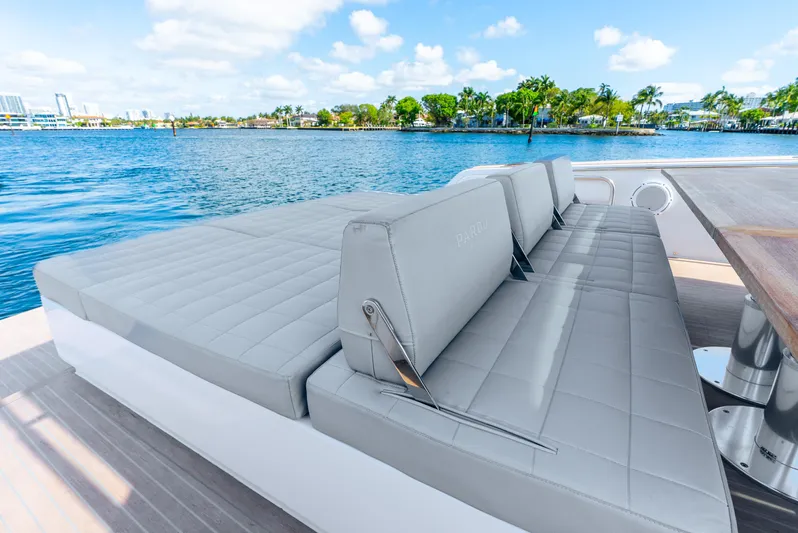  Yacht Photos Pics Luxurious seating on 2021 Pardo Yachts 43, overlooking serene waters and lush greenery.