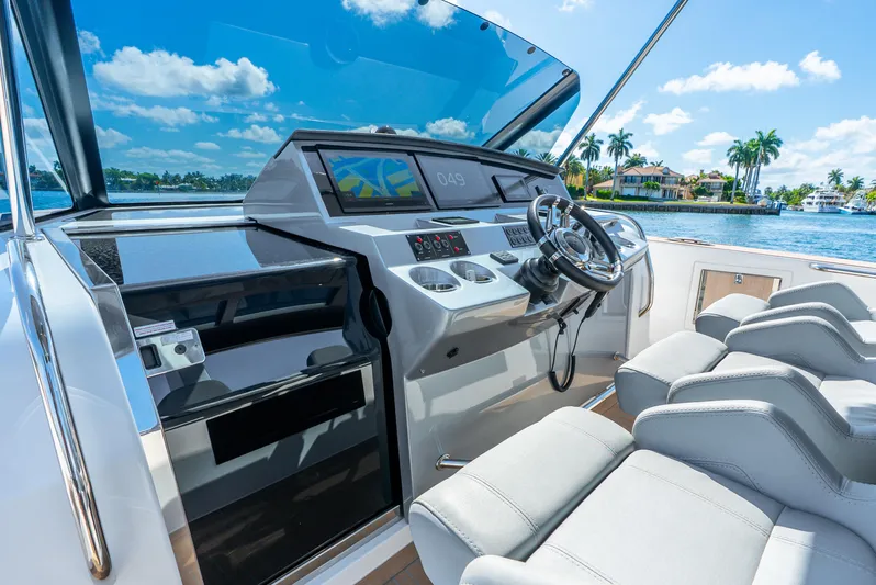  Yacht Photos Pics Luxurious helm of 2021 Pardo Yachts 43 with modern controls and plush seating.