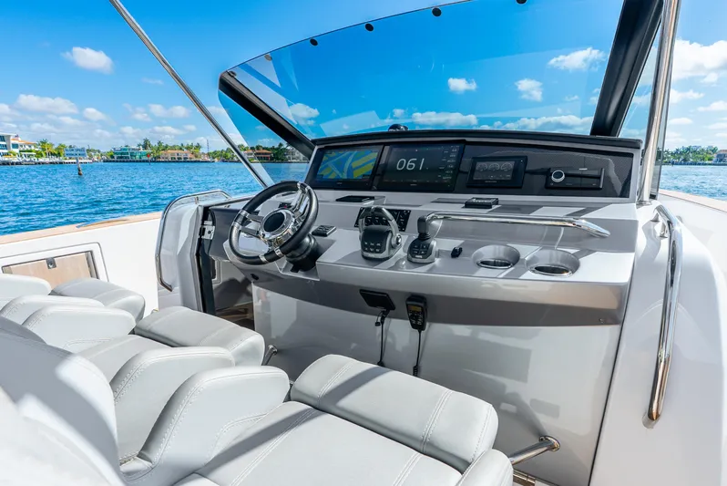  Yacht Photos Pics Cockpit of 2021 Pardo Yachts 43 with modern controls and ocean view.