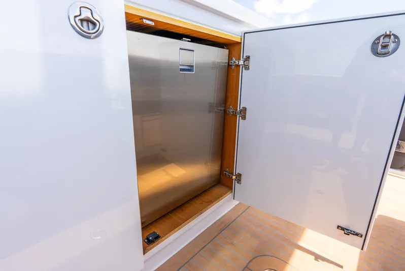  Yacht Photos Pics Open storage compartment on 2021 Pardo Yachts 43, showcasing sleek design and functionality.