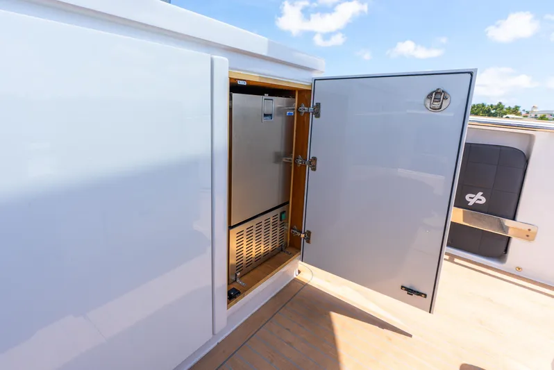  Yacht Photos Pics Open storage compartment on 2021 Pardo Yachts 43, showcasing interior details.