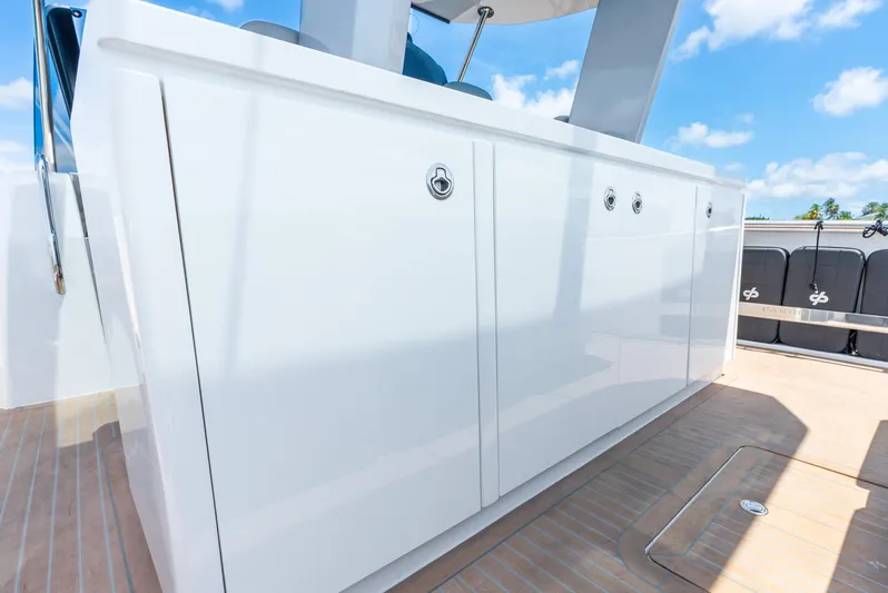 Yacht Photos Pics Pardo Yachts 43, 2021 model, sleek white cabinetry on deck under blue sky.