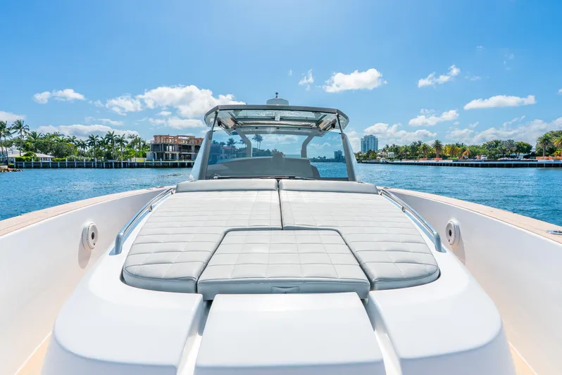  Yacht Photos Pics Luxurious 2021 Pardo Yachts 43 on serene water, sunny day, clear skies.