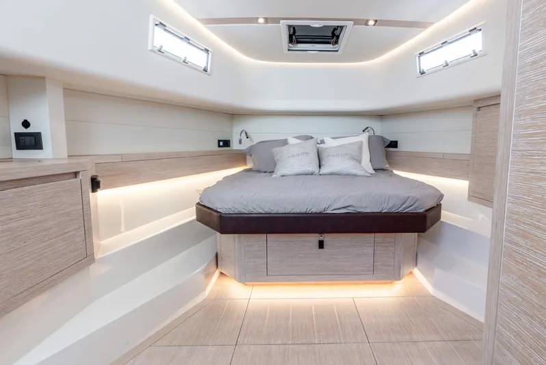  Yacht Photos Pics Luxurious interior of 2021 Pardo Yachts 43 with modern bed and ambient lighting.