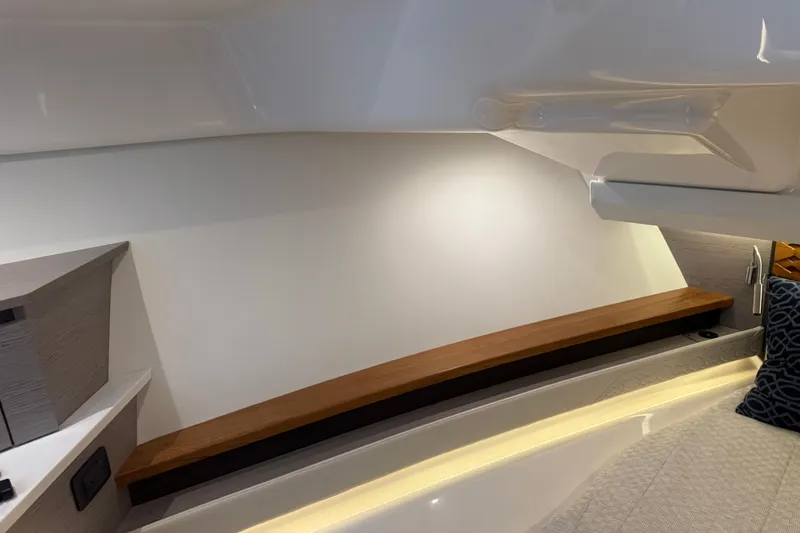  Yacht Photos Pics 2023 Tiara Yachts 48 LS interior cabin with modern design and wooden accents.
