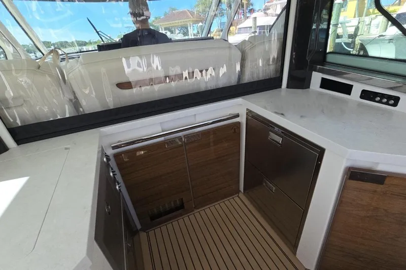  Yacht Photos Pics 2023 Tiara Yachts 48 LS interior with sleek cabinetry and modern design.