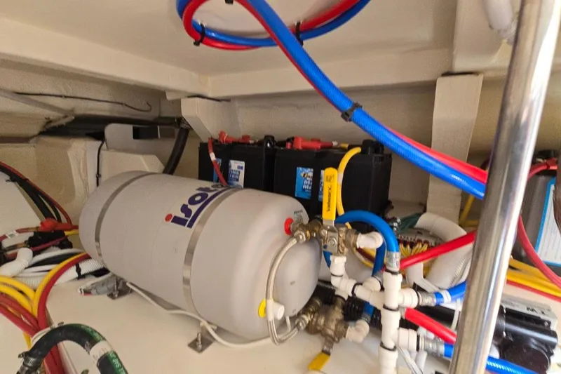  Yacht Photos Pics Engine compartment of 2023 Tiara Yachts 48 LS with wiring and components.