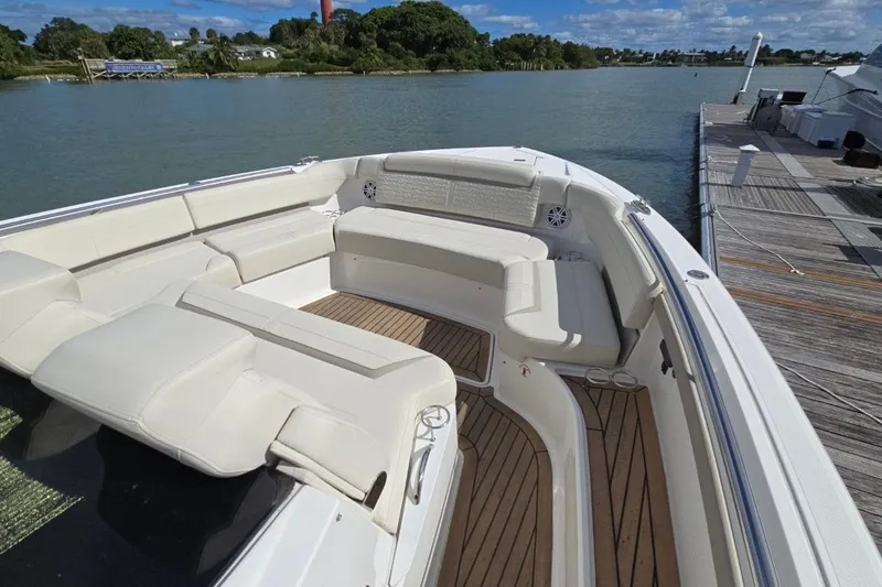  Yacht Photos Pics Luxurious 2023 Tiara Yachts 48 LS with spacious seating and elegant design.