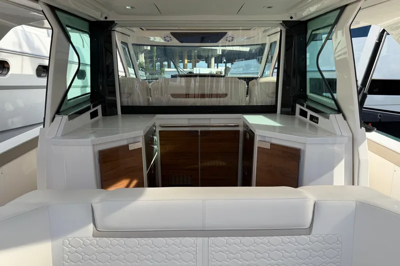  Yacht Photos Pics Interior of 2023 Tiara Yachts 48 LS, featuring sleek design and luxurious seating.