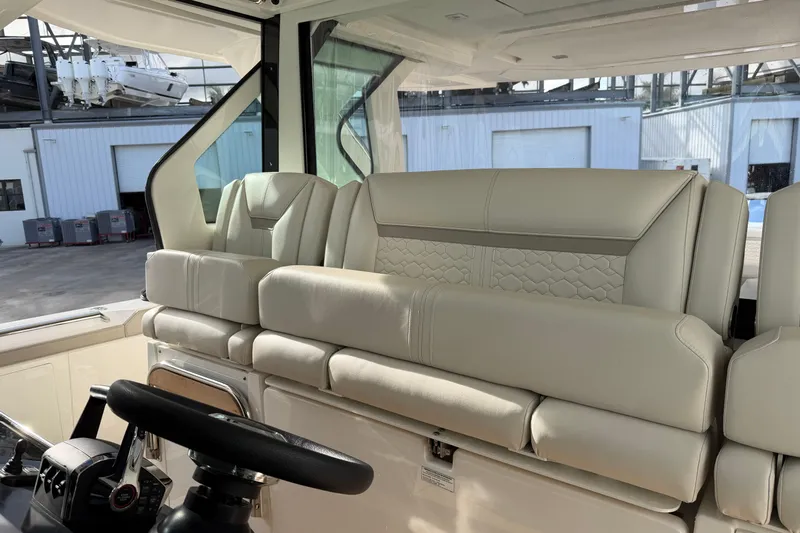  Yacht Photos Pics Luxurious interior seating of 2023 Tiara Yachts 48 LS, featuring elegant design and comfort.
