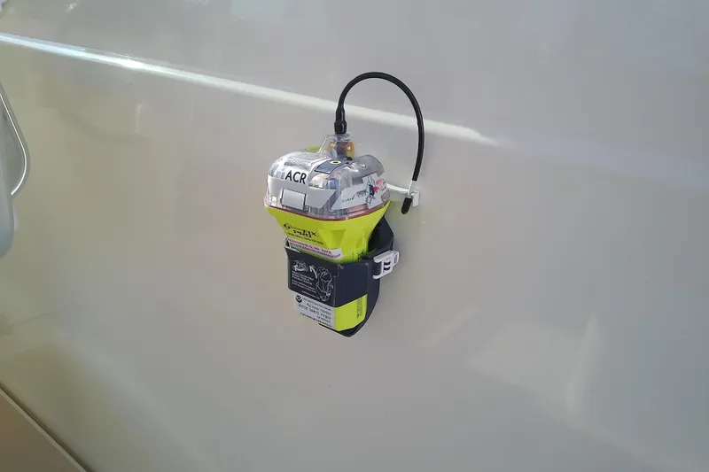 Kathrine E. Yacht Photos Pics Emergency beacon mounted on 2002 Sabreline 36 Express boat exterior.
