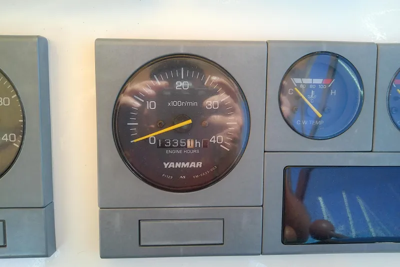 Kathrine E. Yacht Photos Pics Yanmar engine gauges on 2002 Sabreline 36 Express, showing 1335 engine hours.
