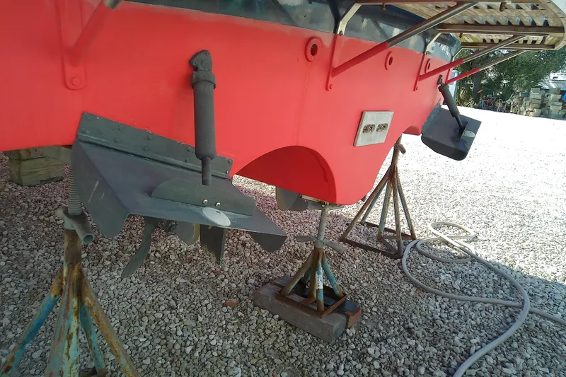 Kathrine E. Yacht Photos Pics 2002 Sabreline 36 Express boat hull on stands, showing propeller and rudder.