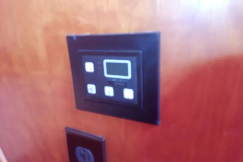 Kathrine E. Yacht Photos Pics Control panel on 2002 Sabreline 36 Express boat interior.