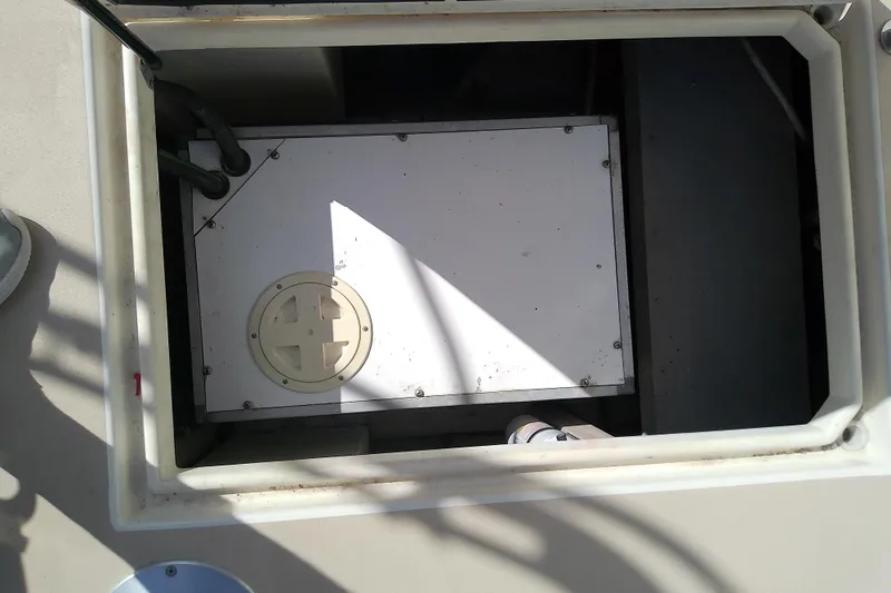 Kathrine E. Yacht Photos Pics Engine compartment of 2002 Sabreline 36 Express boat, showing mechanical components.