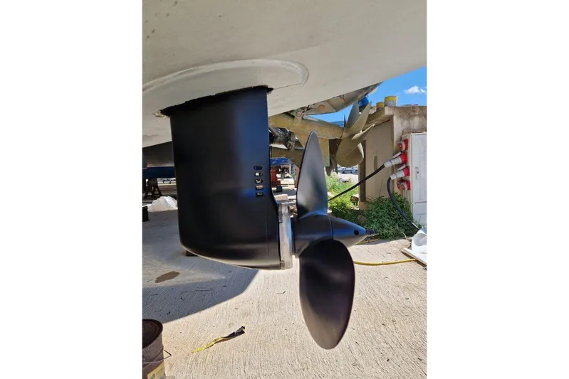  Yacht Photos Pics Close-up of a 2017 Lagoon 42 boat propeller in a shipyard setting.