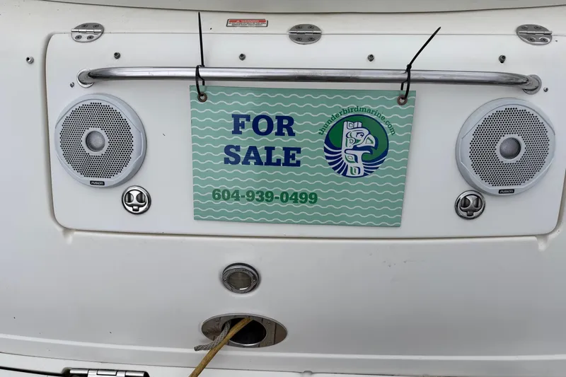  Yacht Photos Pics 2004 Sea Ray 420 Sundancer for sale sign with contact number and speakers.