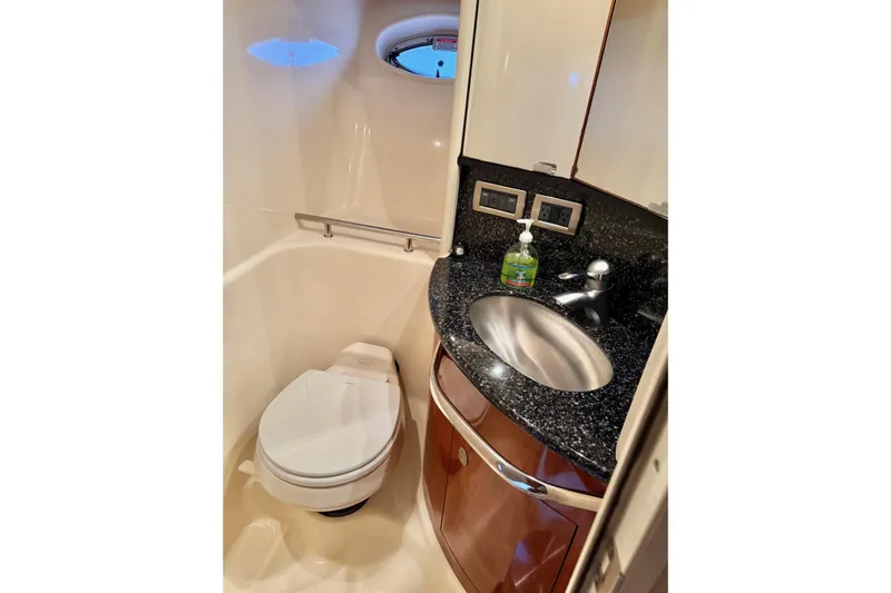  Yacht Photos Pics Luxurious bathroom in 2004 Sea Ray 420 Sundancer yacht with modern fixtures.