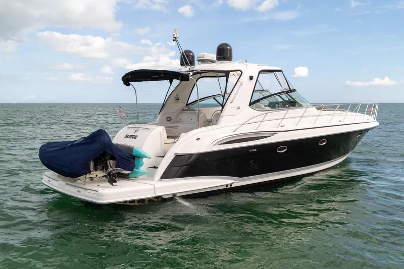  Yacht Photos Pics 2005 Formula 48 Yacht cruising on open water under a clear sky.