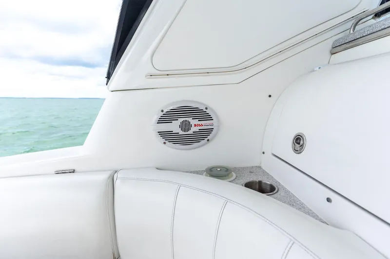  Yacht Photos Pics Interior of 2005 Formula 48 Yacht with speaker and seating, overlooking the ocean.