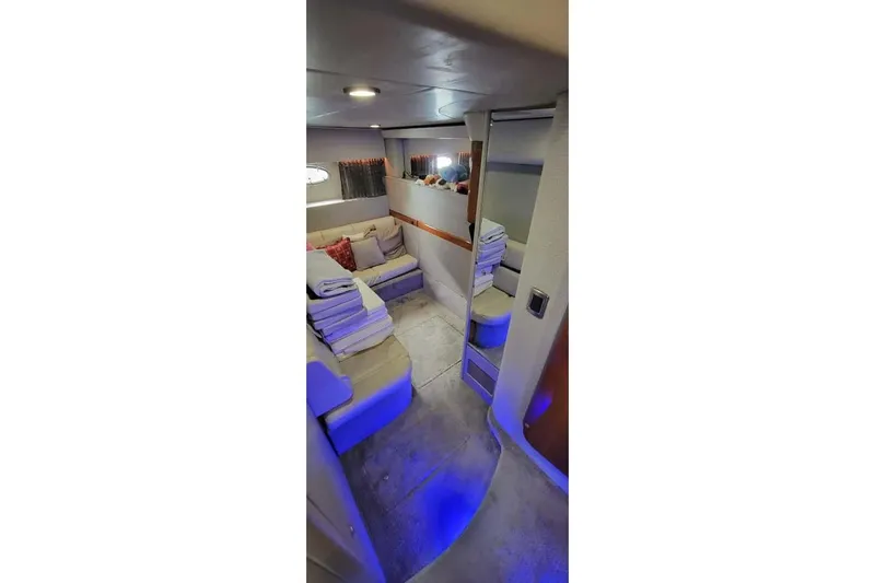  Yacht Photos Pics Luxurious interior of 2005 Formula 48 Yacht with cozy seating and ambient lighting.