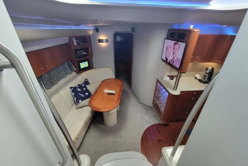  Yacht Photos Pics Luxurious interior of 2005 Formula 48 Yacht with cozy seating and modern amenities.