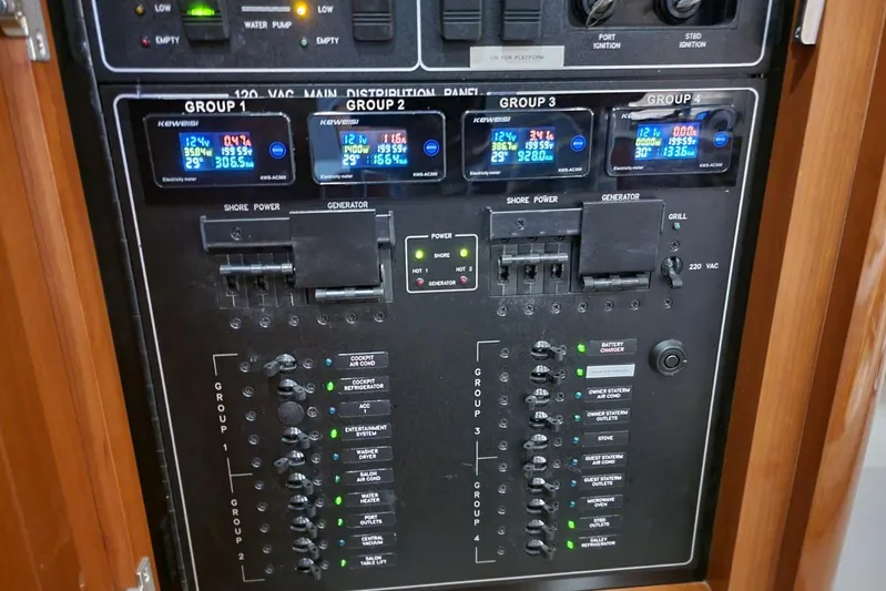  Yacht Photos Pics Electrical control panel of a 2005 Formula 48 Yacht with digital displays and switches.