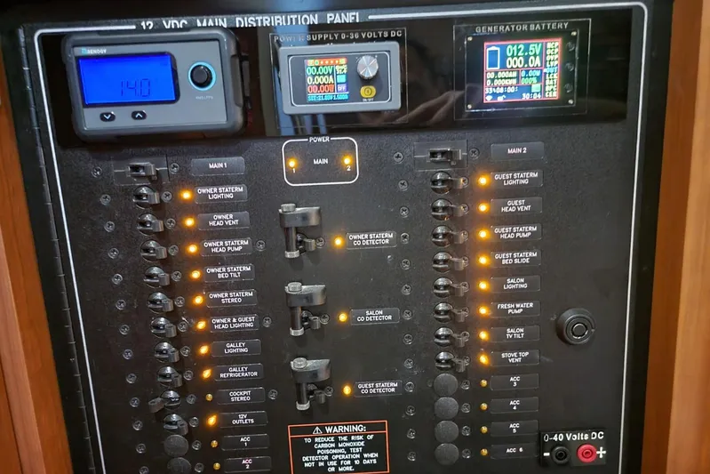  Yacht Photos Pics Electrical control panel of a 2005 Formula 48 Yacht with illuminated switches and digital displays.