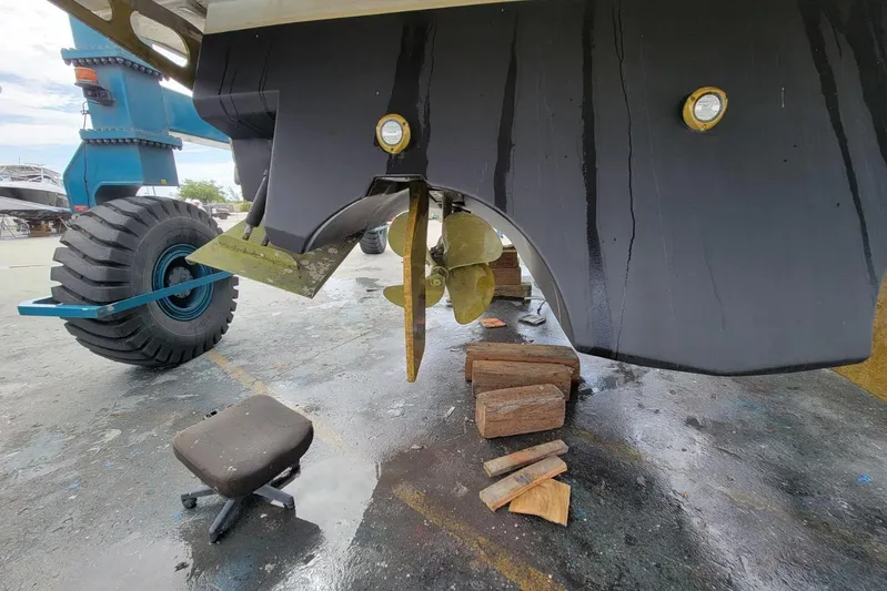  Yacht Photos Pics 2005 Formula 48 Yacht under maintenance, showing propeller and hull details.