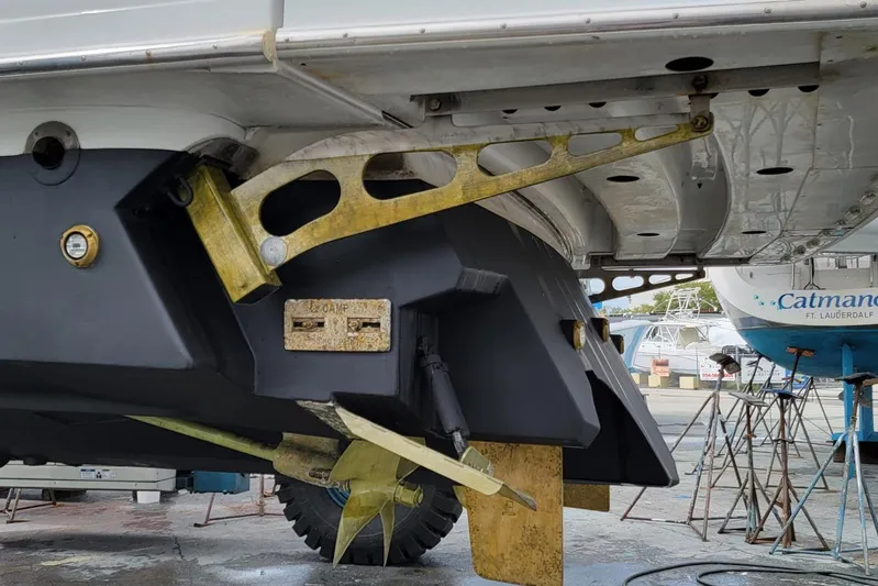  Yacht Photos Pics 2005 Formula 48 Yacht under maintenance, showcasing propeller and hull details.